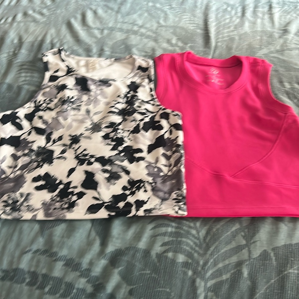 Two crop tops very slightly worn, pink and black and white.